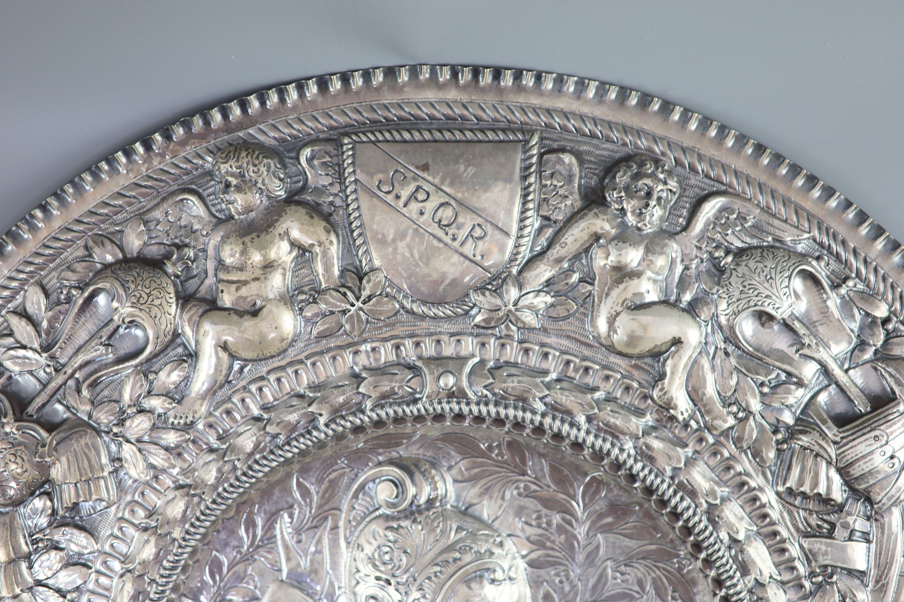 A large late 19th century Italian repousse 800 standard silver charger